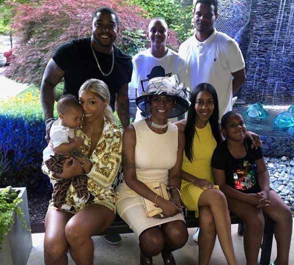 Momma Dee taking picture with her family.